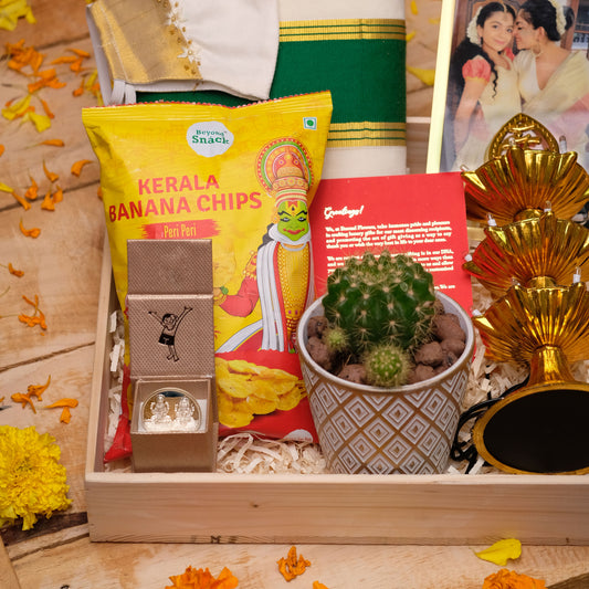 Chithira Onam Gift Hamper with Silver Coin, Set Saree/Dhoti, Succulent, Lamp and Décor | 05g Silver Coin | Precious Onam Souvenir