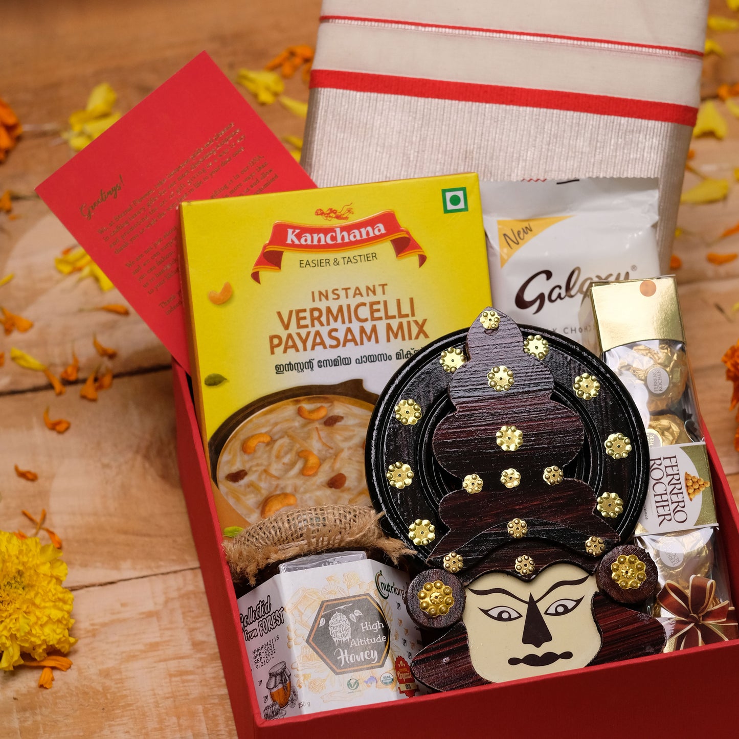Mudra Onam Gift Hamper with Set Saree, Chocolates, Payasam Mix & Kathakali Décor | Kerala Handicraft Wooden Katakali Face | Cultural Onam Craftsmanship