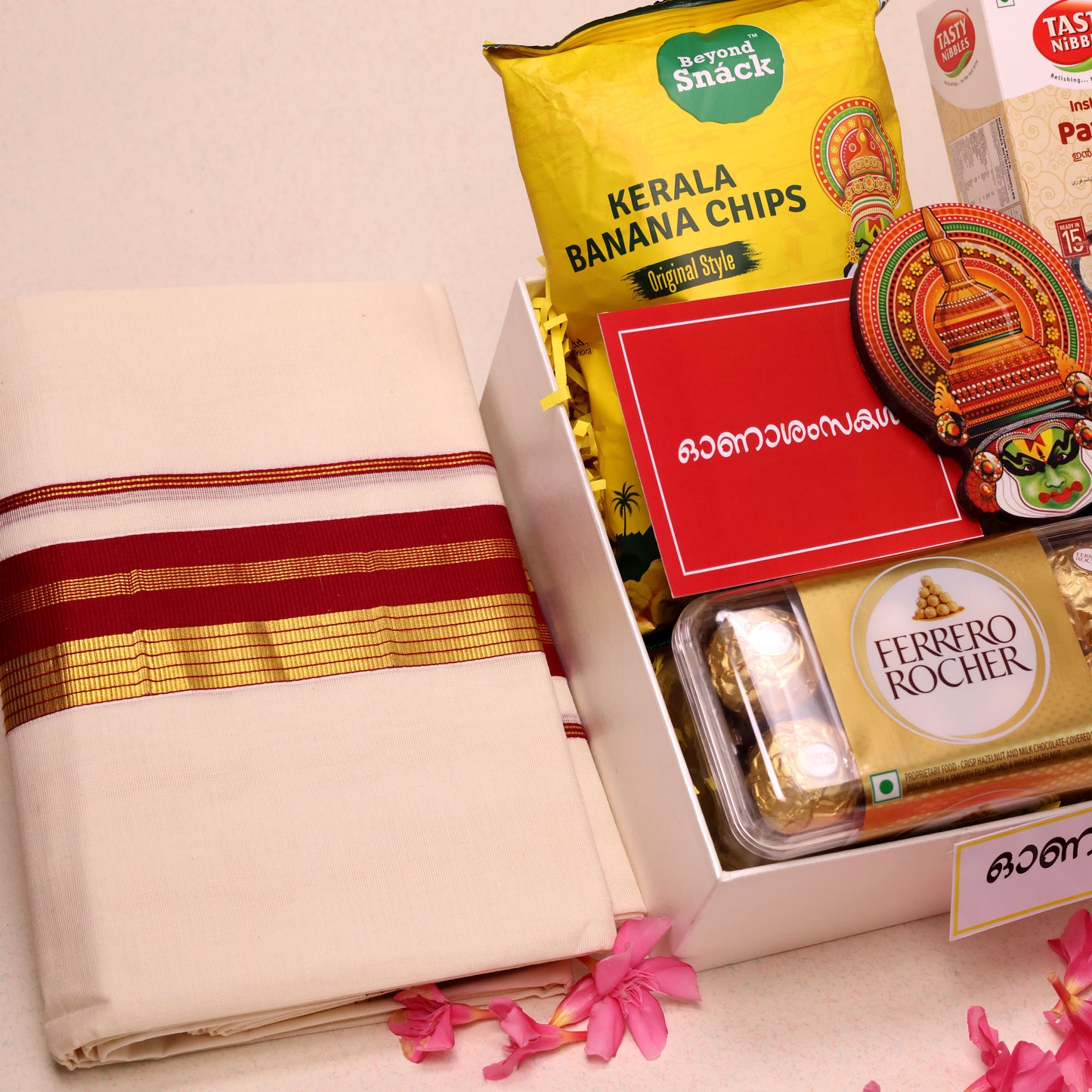 Kerala Onam Utharadam Hamper | Kerala Onam Utharadam Hamper | Green Tea, Palada Payasam, Banana Chips, and Chocolates