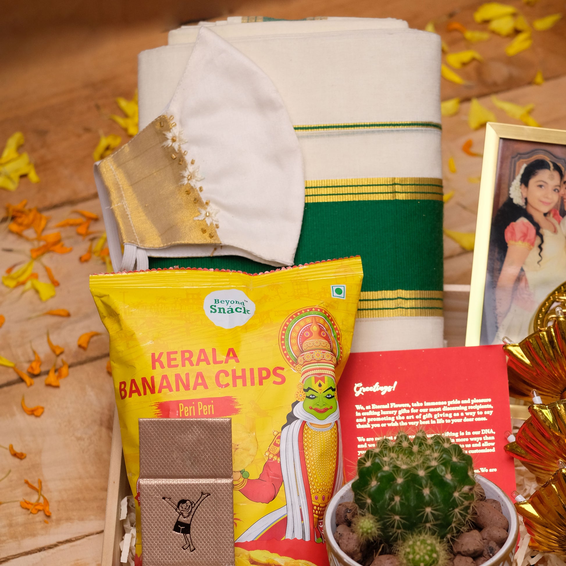 Chithira Onam Gift Hamper with Silver Coin, Set Saree/Dhoti, Succulent, Lamp and Décor | Traditional Kerala Set Saree/Dhoti | Authentic Onam Attire
