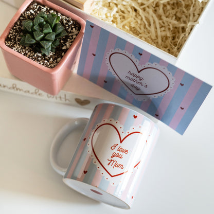 Celebrate the most special woman in your life with the 'I Love You Mom' Gift Hamper – a beautiful blend of love, memories, and self-care.
