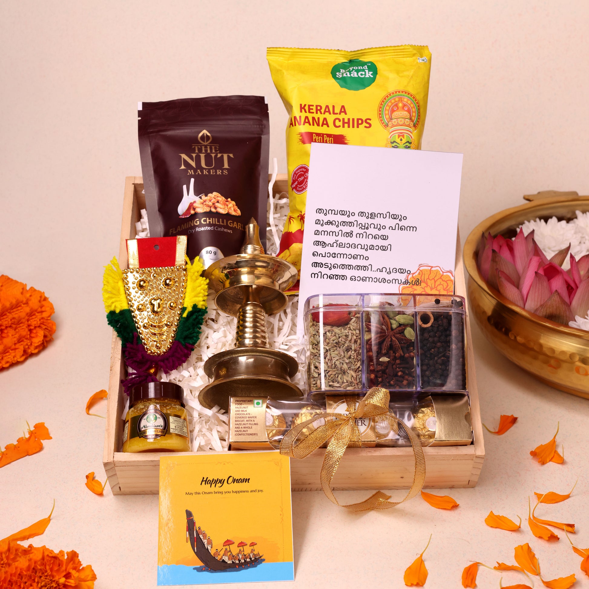 Nilavilakku Onam Gift Hamper with Brass Lamp, Spices, Ghee, Banana Chips and Chocolates in Wooden Tray