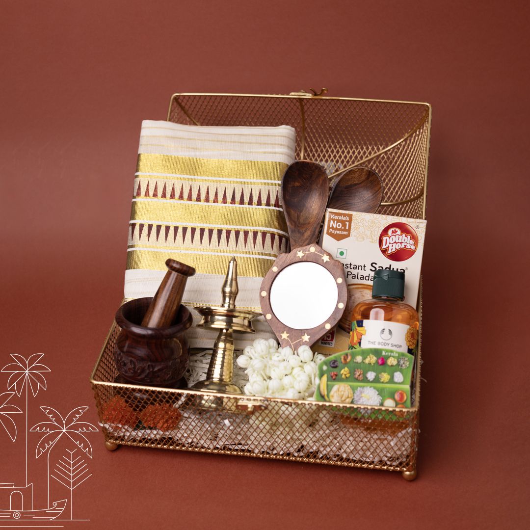 Onakodi Premium Kerala Onam Gift Hamper with Set Saree, Brass Nilavilakku and Golden Basket