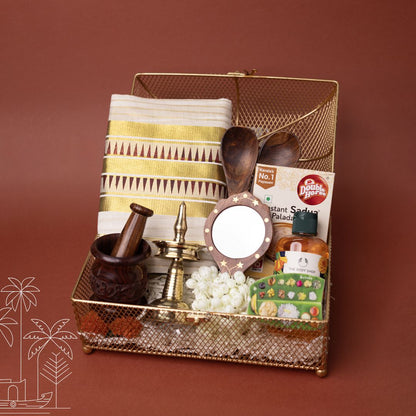 Onakodi Premium Kerala Onam Gift Hamper with Set Saree, Brass Nilavilakku and Golden Basket