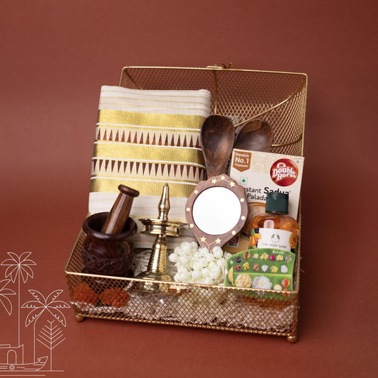 Onakodi Premium Kerala Onam Gift Hamper with Set Saree, Brass Nilavilakku and Golden Basket