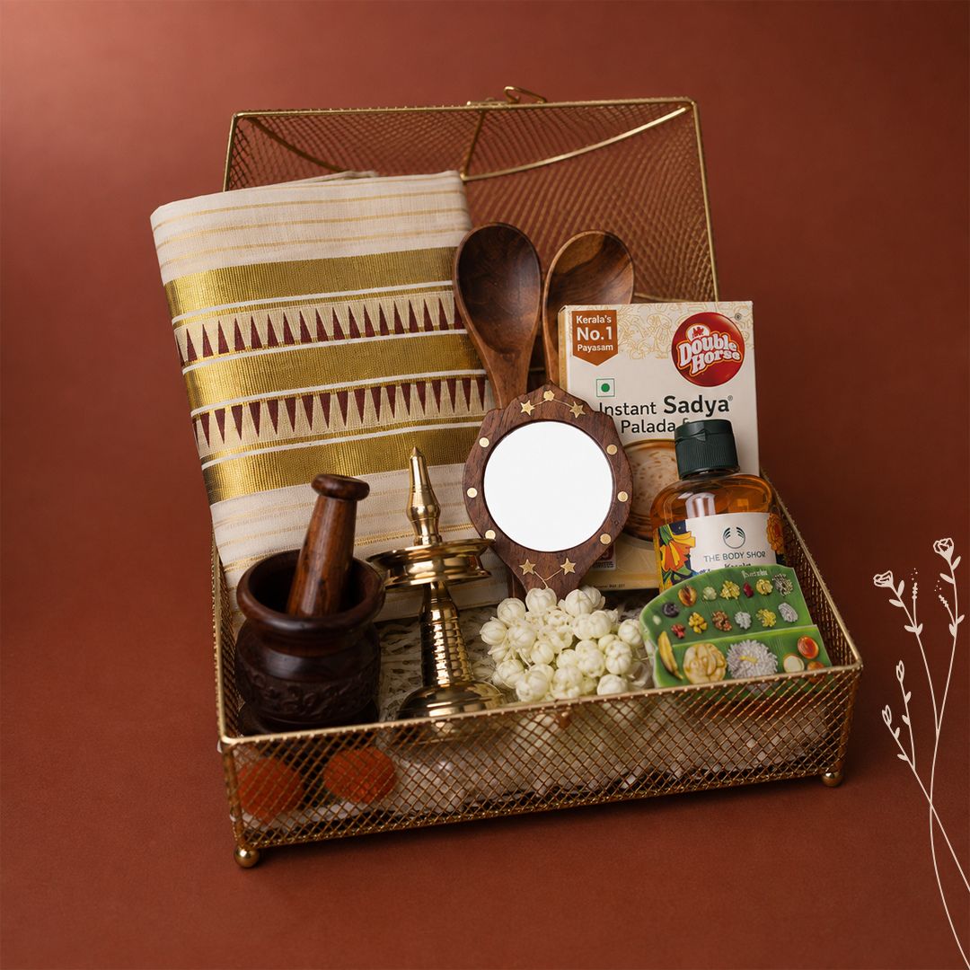 Onakodi Premium Kerala Onam Gift Hamper with Set Saree, Brass Nilavilakku and Golden Basket