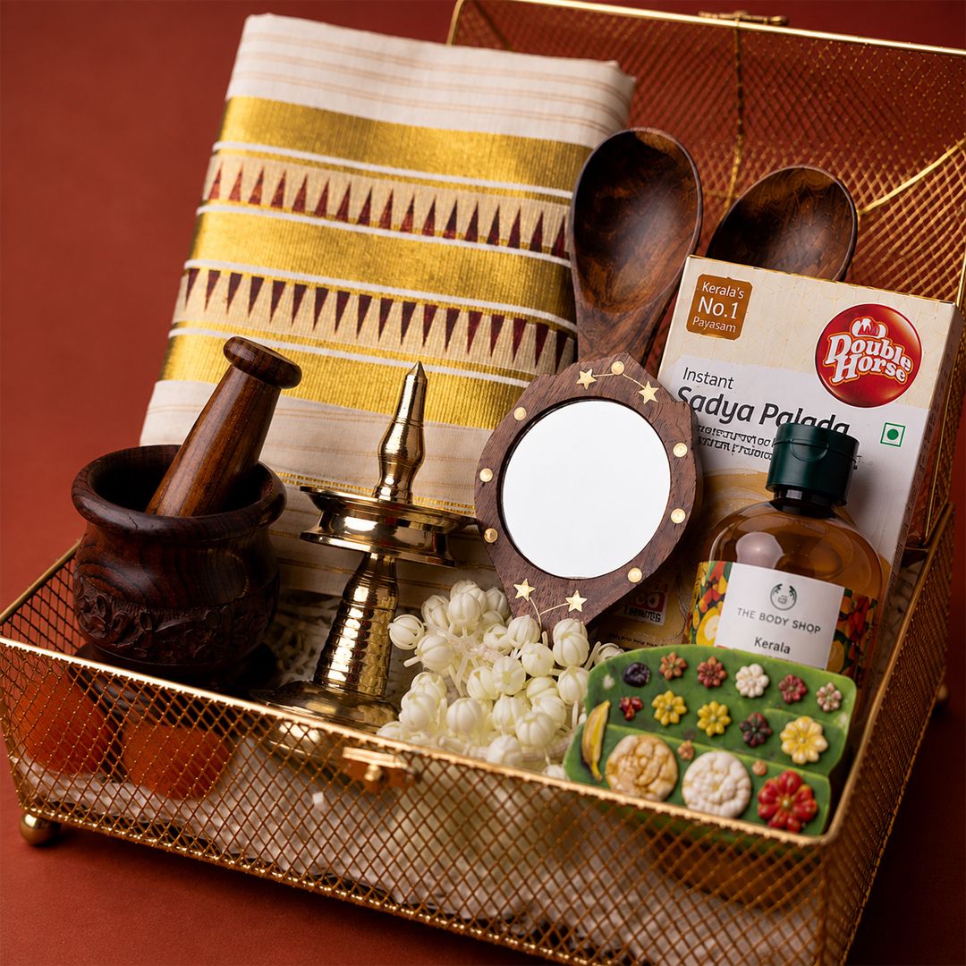 Onakodi Premium Kerala Onam Gift Hamper with Set Saree, Brass Nilavilakku and Golden Basket