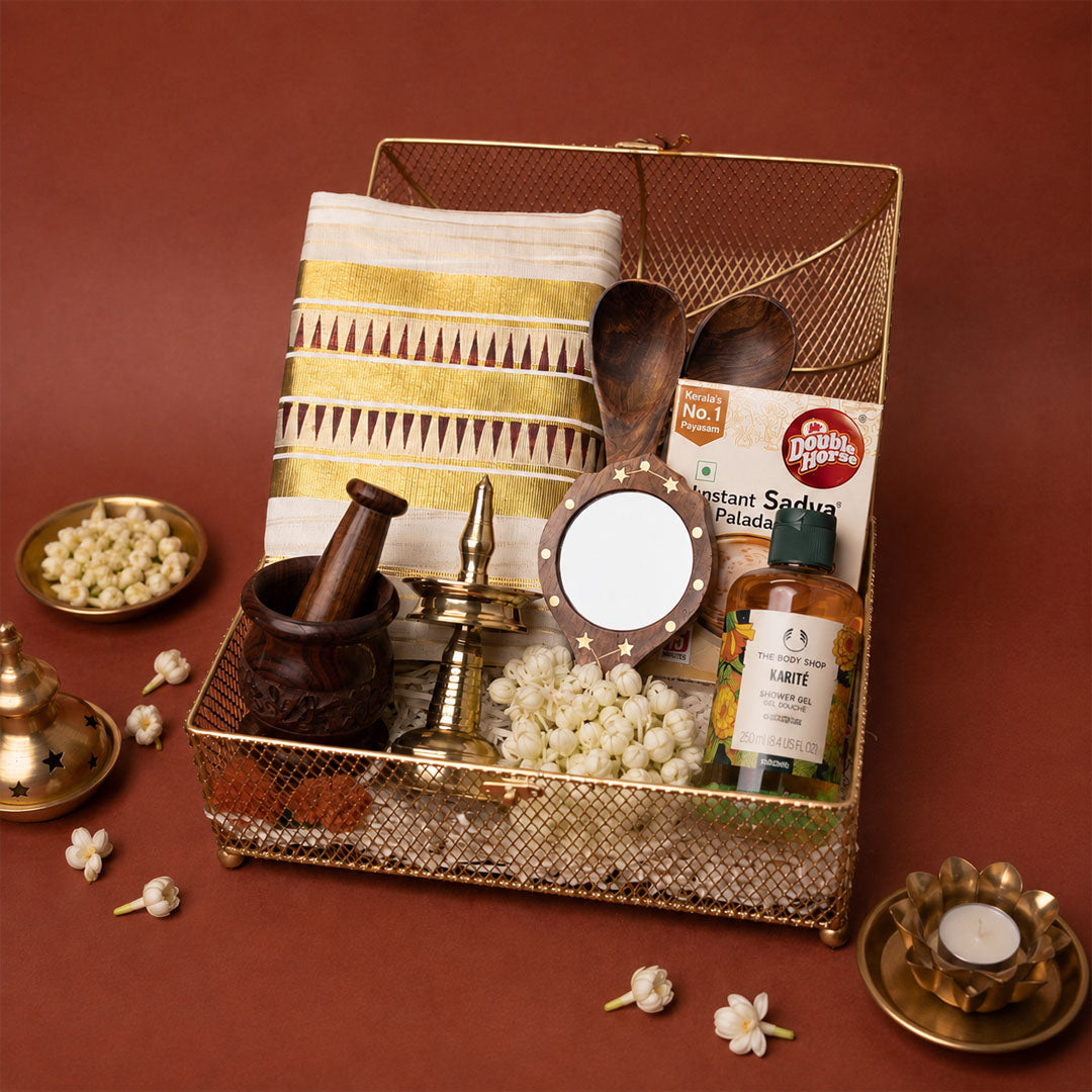 Onakodi Premium Kerala Onam Gift Hamper with Set Saree, Brass Nilavilakku and Golden Basket