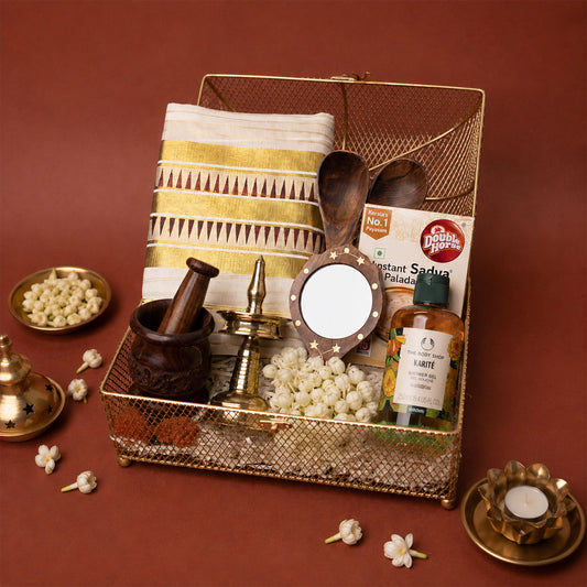 Onakodi Premium Kerala Onam Gift Hamper with Set Saree, Brass Nilavilakku and Golden Basket