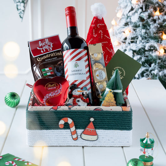 The Jolly Feast Christmas Gift Hamper with Sparkling Grape Juice, Lindt Chocolates, and Christmas Décor