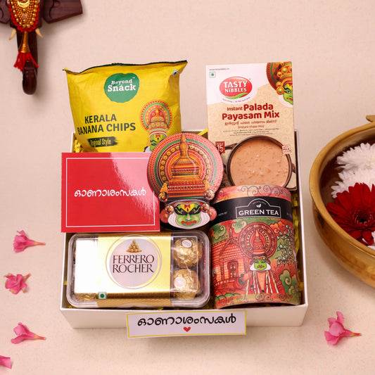 Utharadam Onam Gift Hamper with Green Tea, Chocolates, Banana Chips & Kathakali Wall Décor | Green Tea, Palada Payasam, Banana Chips, and Chocolates